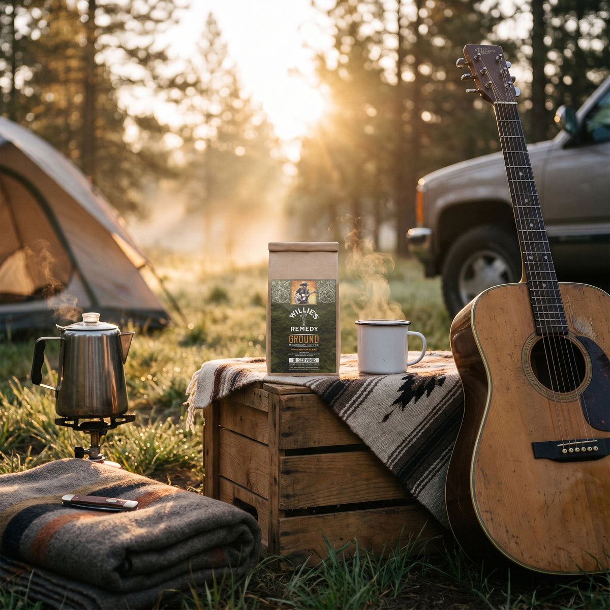 Willie's CBD Ground Mushroom Coffee at a campsite with a guitar and truck