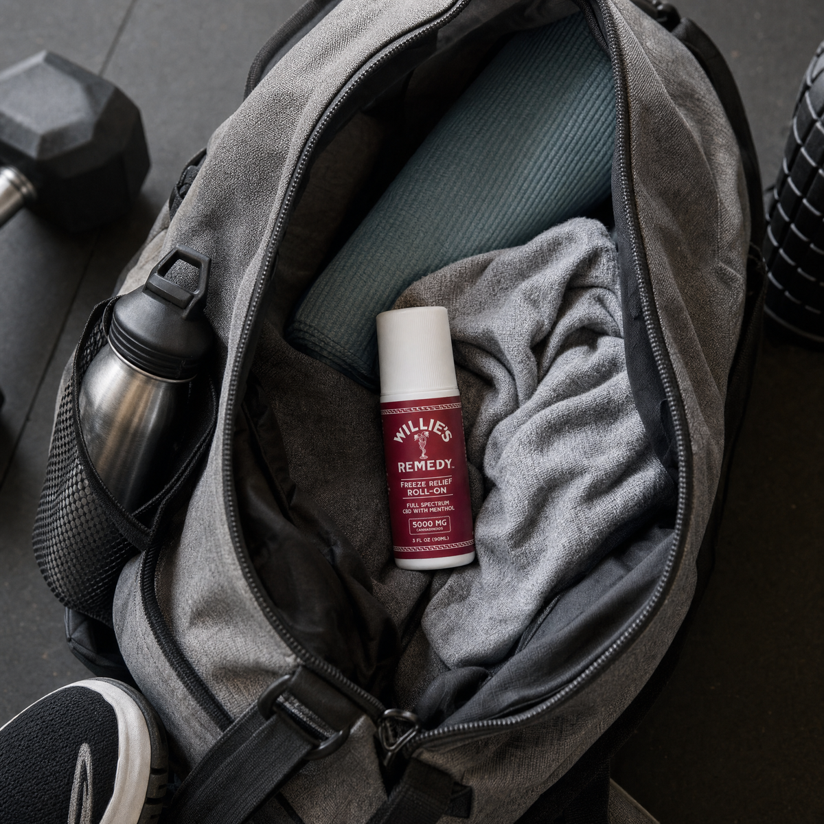 Willie's Remedy Freeze Roll-On tucked into an open gym bag